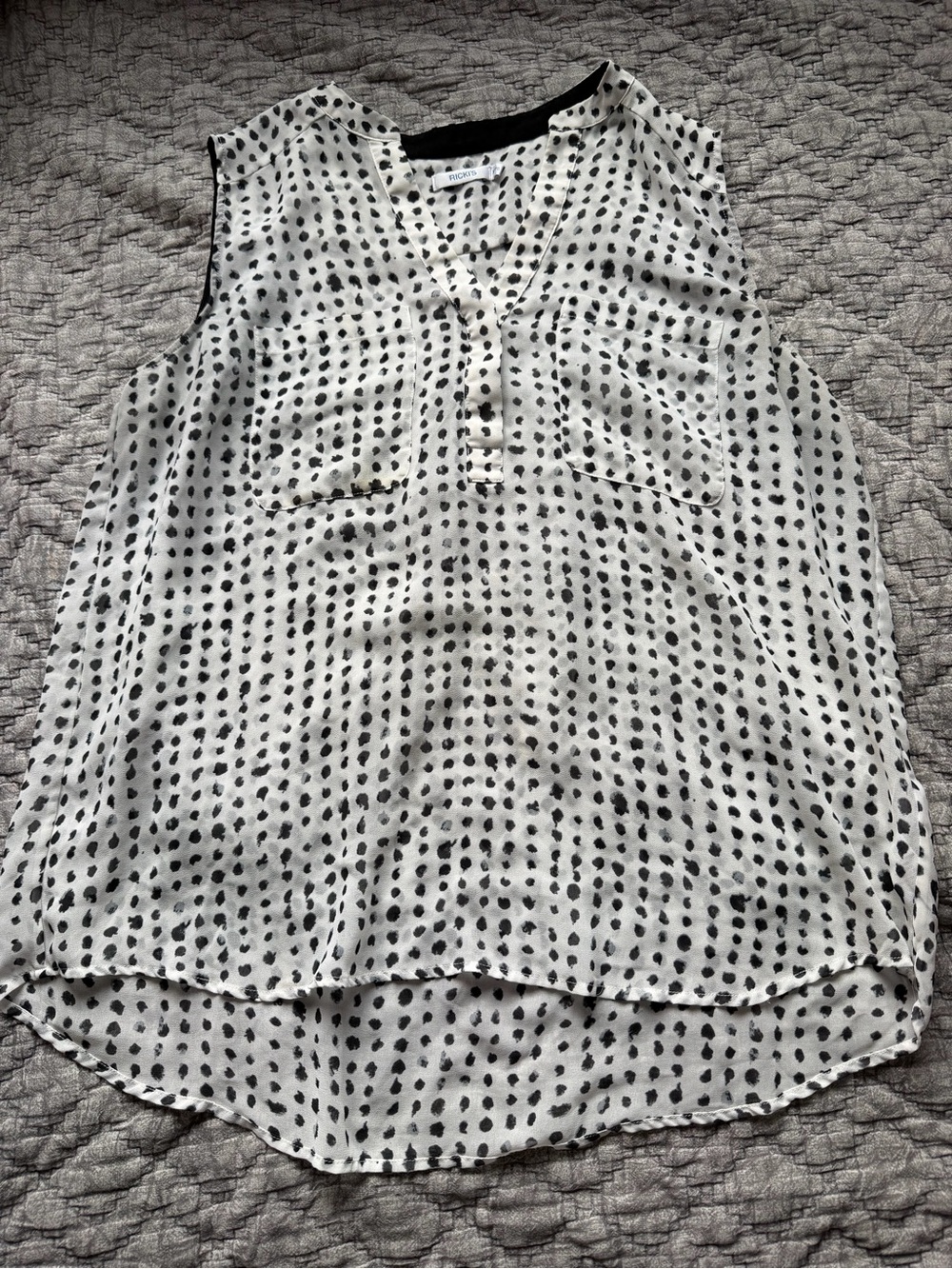 Ricki's White Sleeveless V-Neck Blouse with Black Dot Print